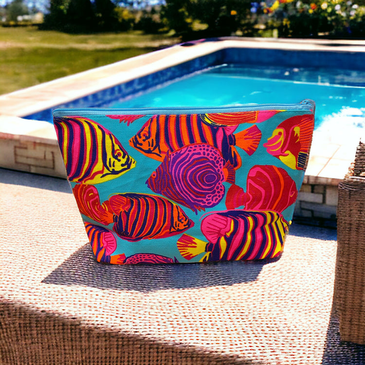 Vibrant tropical fish on aqua clutch