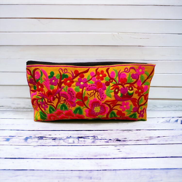 Hot pink and red blossom on sunshine yellow clutch