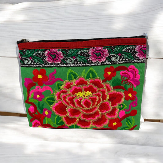 Ruby rose baby blossom on spring green wristlet