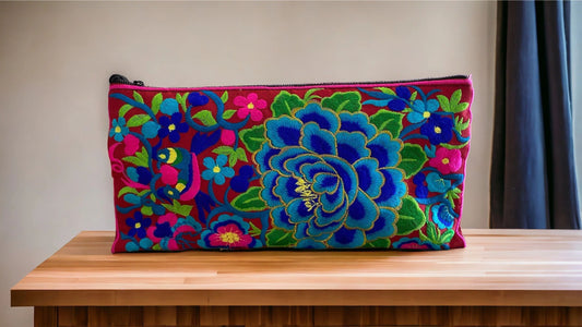 Marine blue & aqua bloom on ruby red clutch