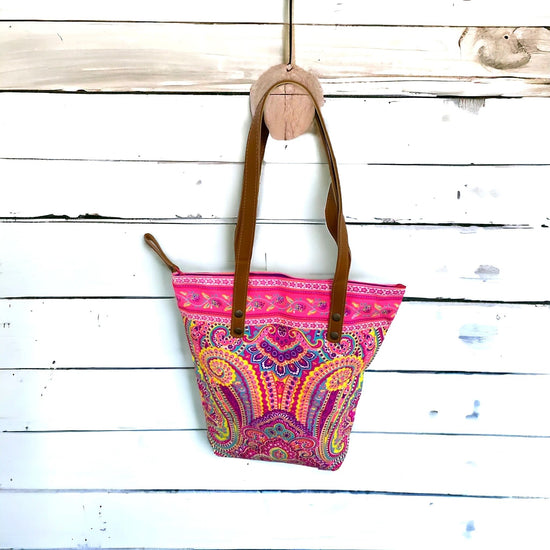 Banana yellow spirals on neon pink midi tote