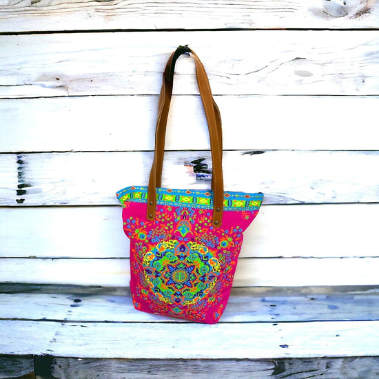 Lime and tangerine mandala on hot pink midi tote