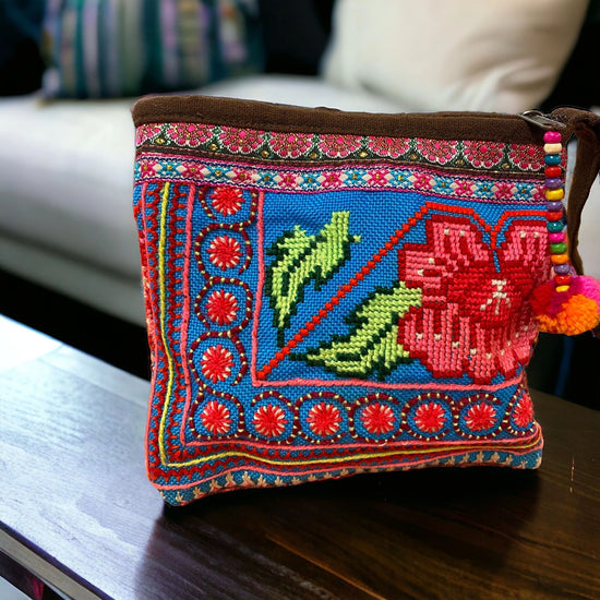 Hill tribe coral blossom on marine blue pouch