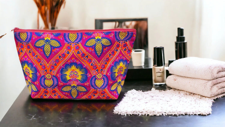 Blue blossom on magenta clutch