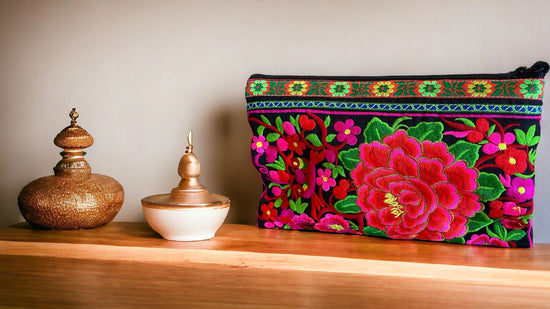 Scarlet and pink bloom on licorice clutch