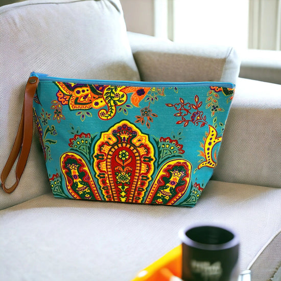 Sunshine yellow and orange paisley on turquoise clutch