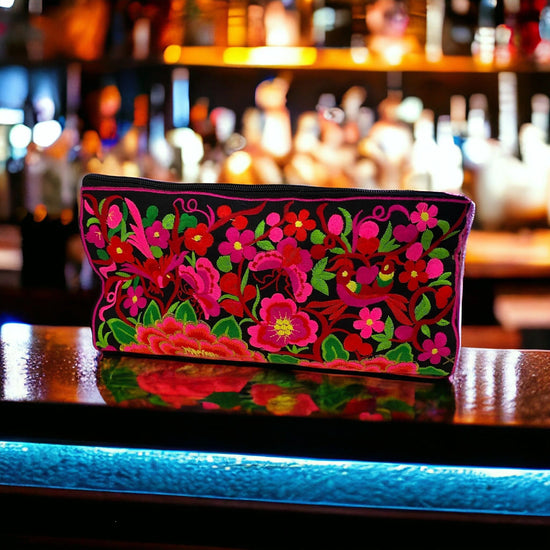 Ruby florals & feathery friends (birds, butterfly) on licorice clutch