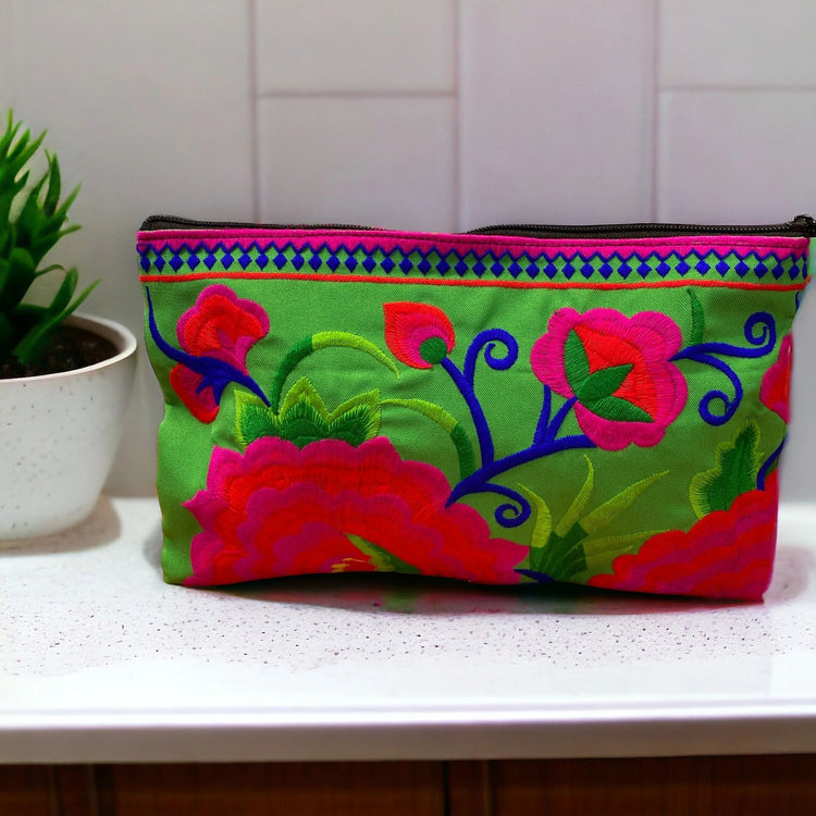 Ruby red and hot pink bloom on spring green clutch