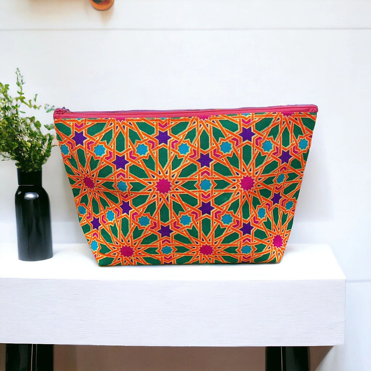 Forest green mandala on tangerine clutch